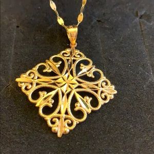 14k Yellow gold necklace and pendant